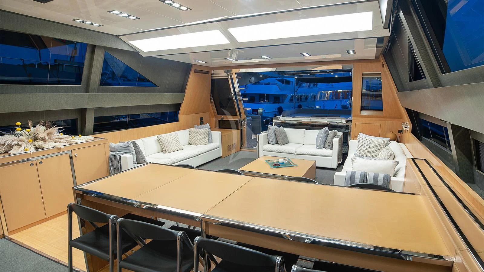 a room with a couch and a table aboard WHATEVER Yacht for Sale