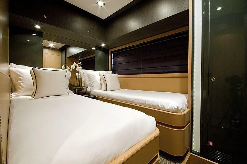 a room with two beds aboard WHATEVER Yacht for Sale