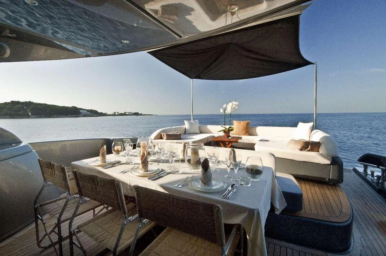 a table set for a meal on a boat aboard WHATEVER Yacht for Sale