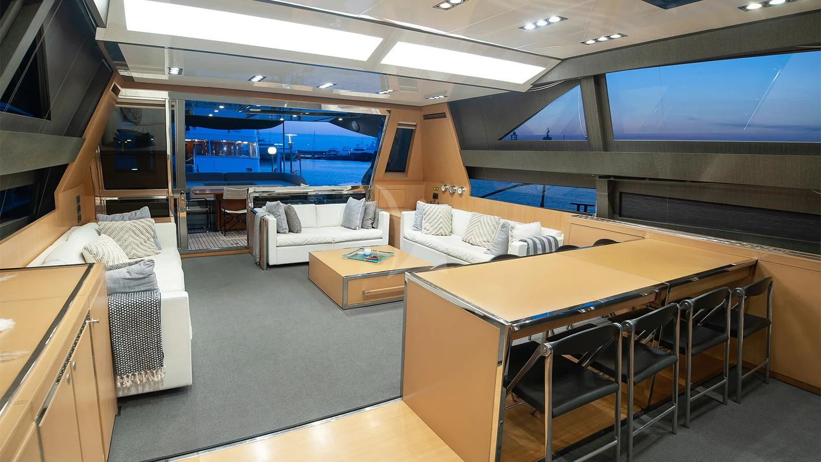 a room with a bed and a table aboard WHATEVER Yacht for Sale
