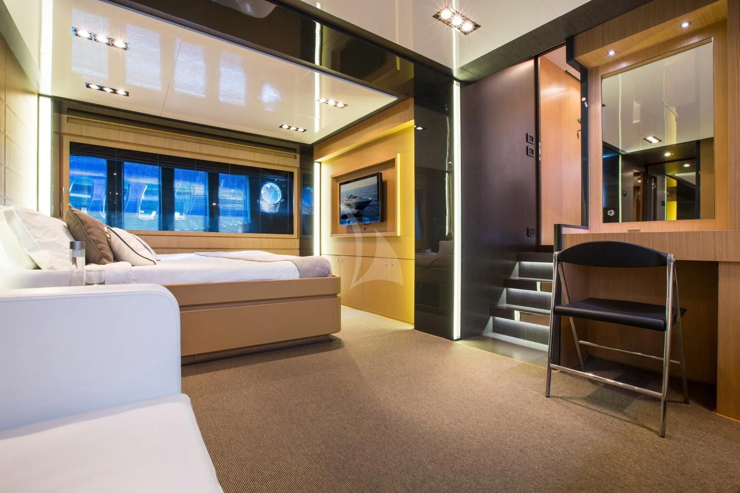 a room with a couch and a chair aboard WHATEVER Yacht for Sale