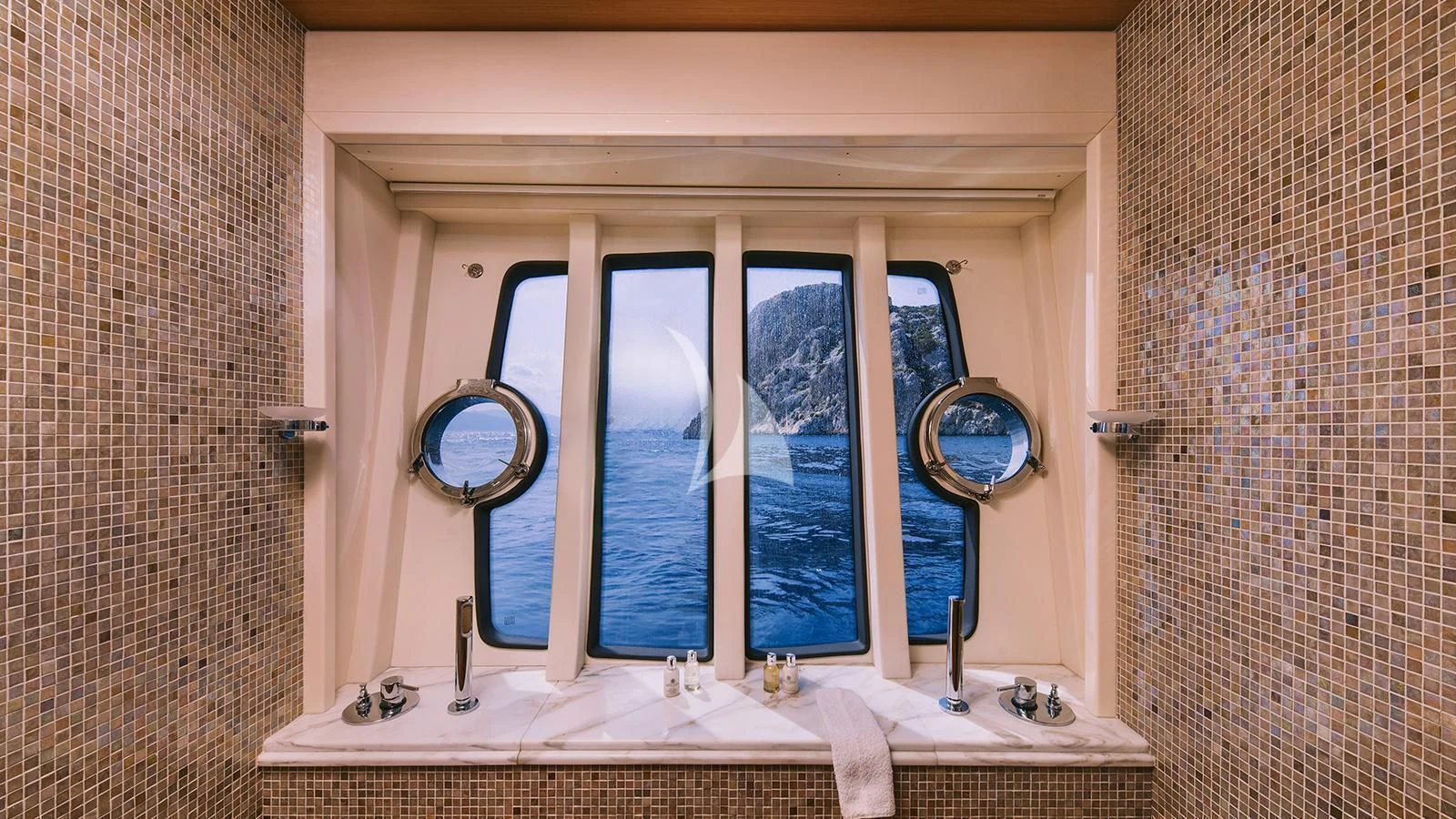 a bathroom with a large mirror aboard MAYBE NOT Yacht for Sale