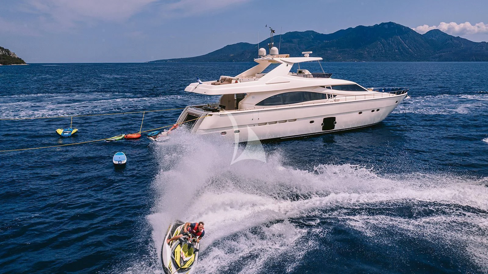 a boat on the water aboard MAYBE NOT Yacht for Sale