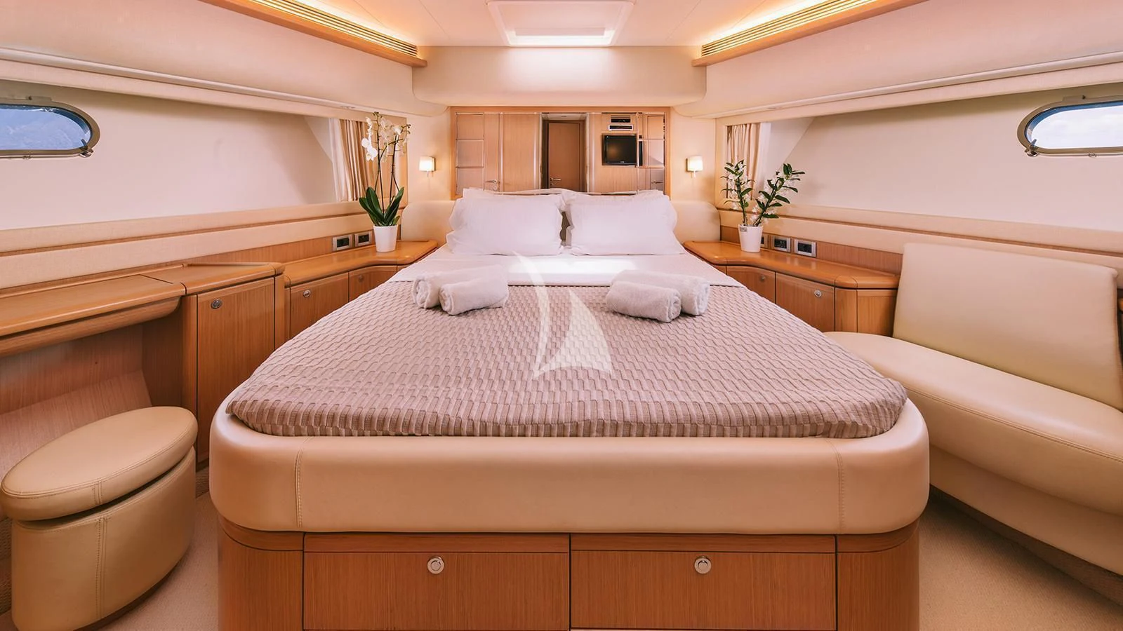 a large bed in a room aboard MAYBE NOT Yacht for Sale