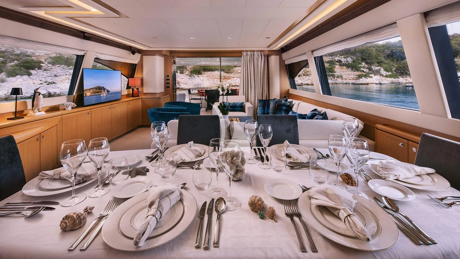 a table set for a dinner aboard MAYBE NOT Yacht for Sale