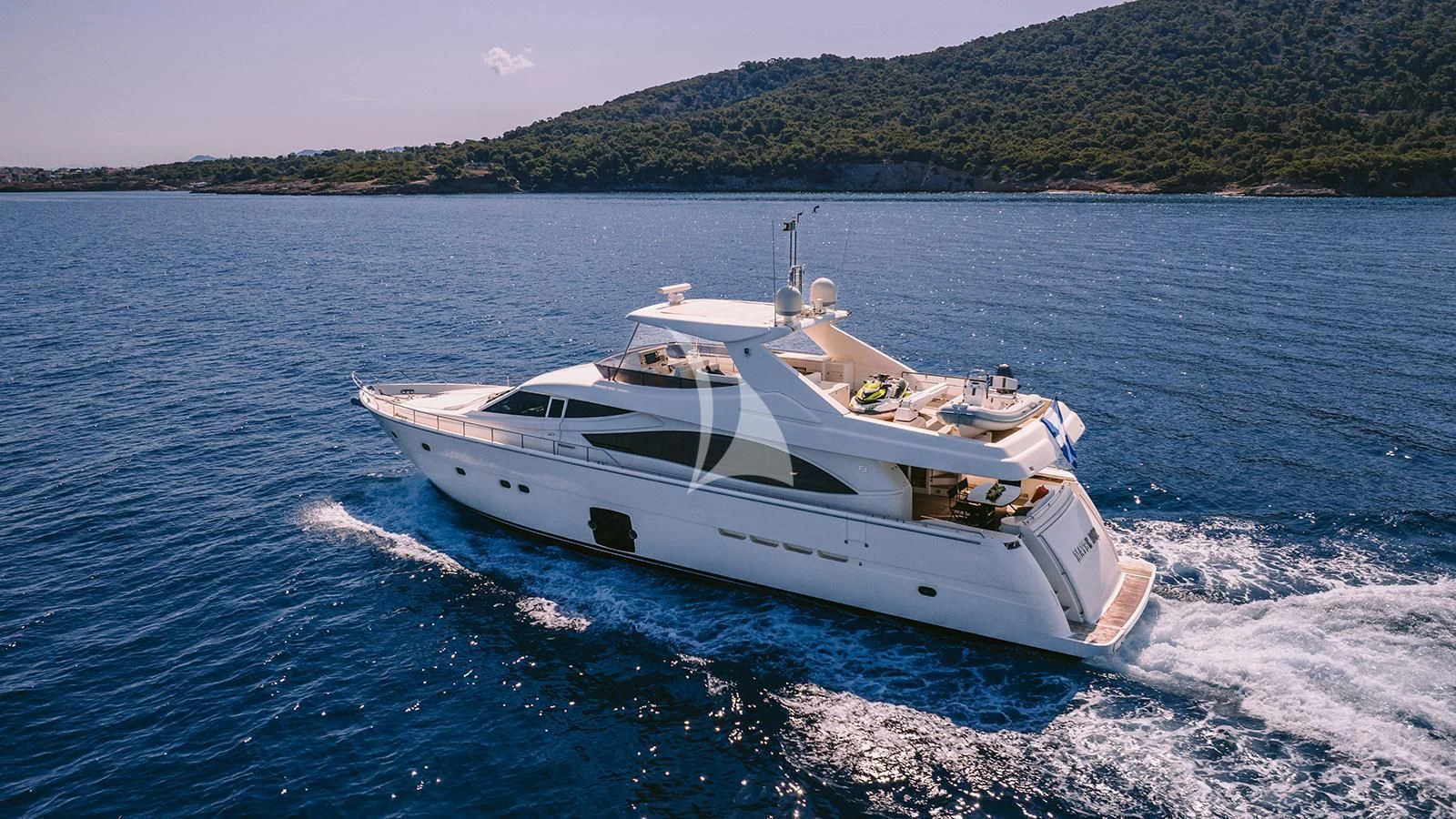 a white yacht on the water aboard MAYBE NOT Yacht for Sale