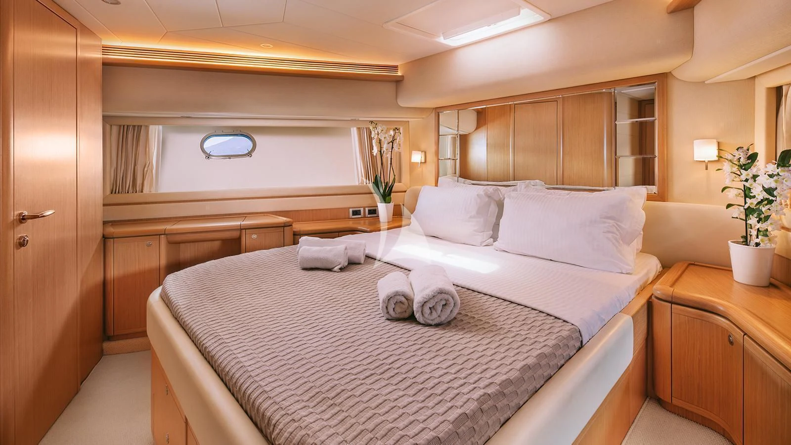 a bed in a room aboard MAYBE NOT Yacht for Sale