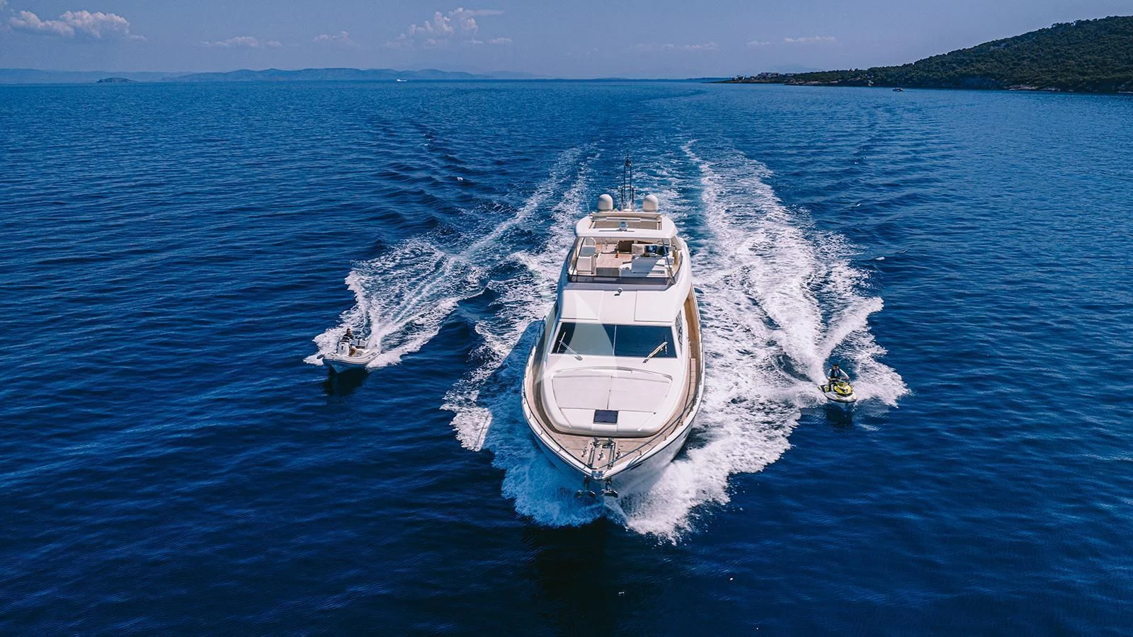 a boat on the water aboard MAYBE NOT Yacht for Sale