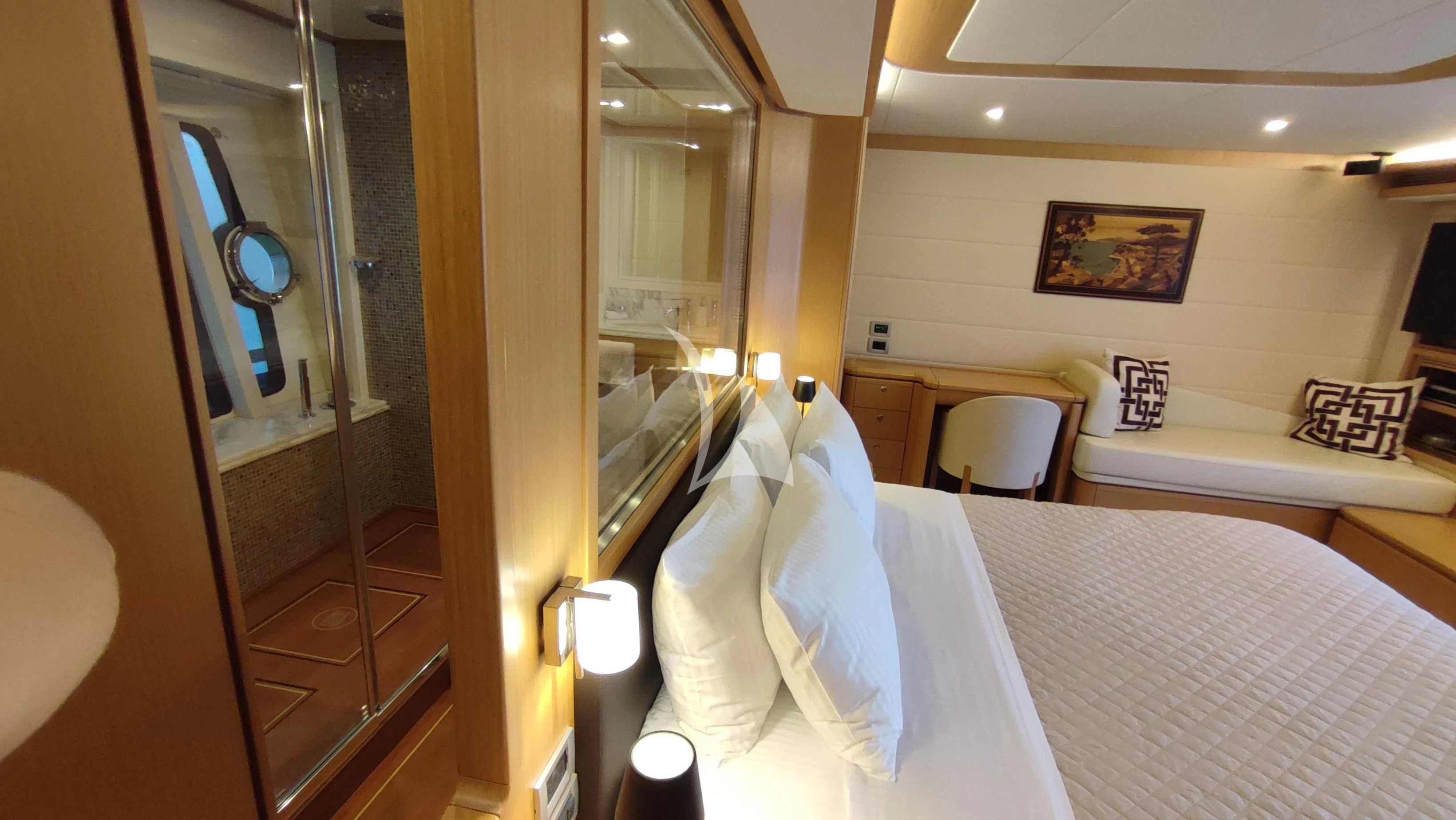 a hotel room with a bed and a mirror aboard MAYBE NOT Yacht for Sale
