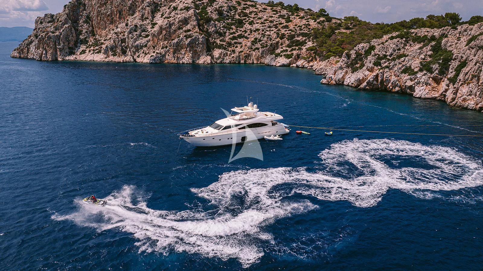 a boat on the water aboard MAYBE NOT Yacht for Sale