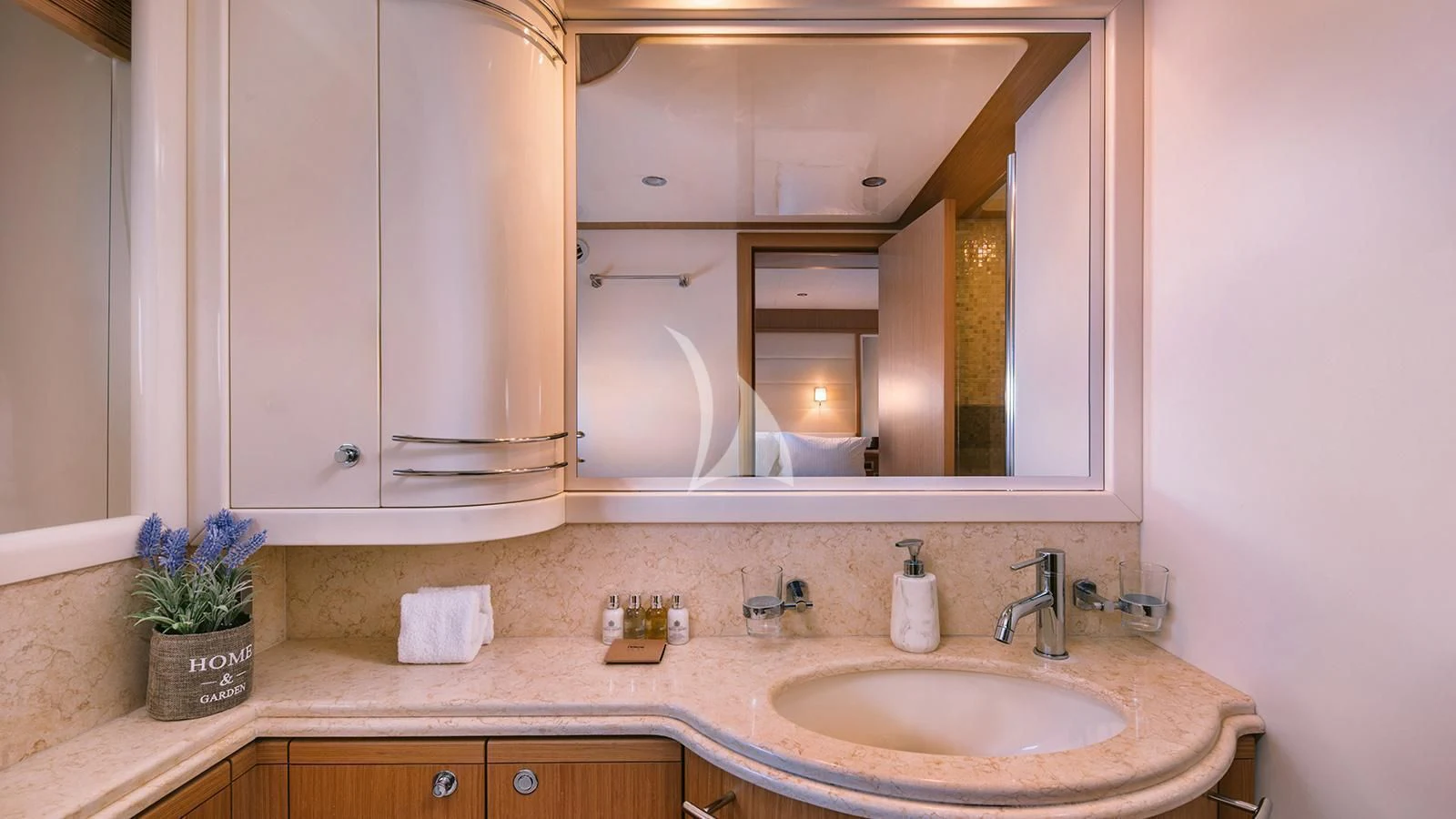 a bathroom with a large mirror aboard MAYBE NOT Yacht for Sale
