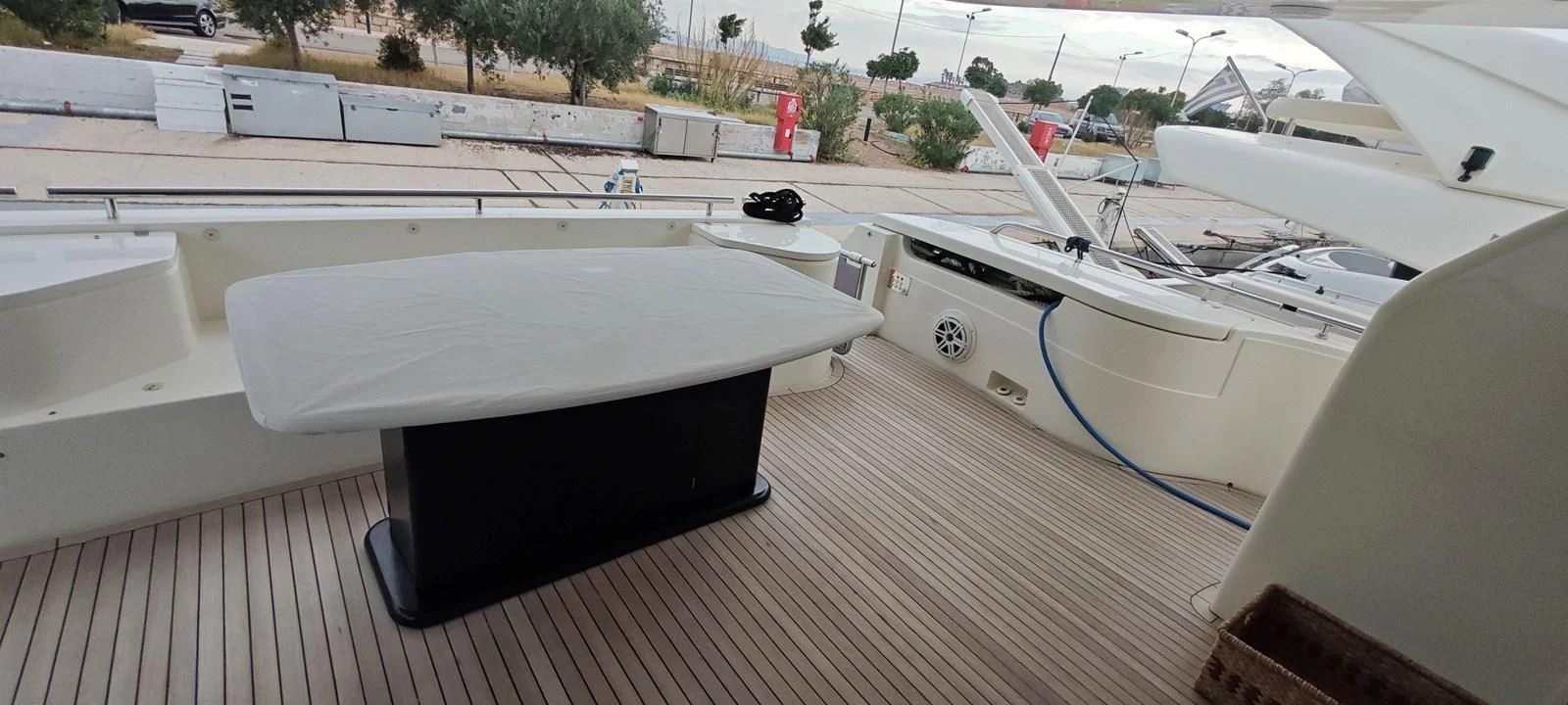 a deck with a row of boats on it aboard MAYBE NOT Yacht for Sale