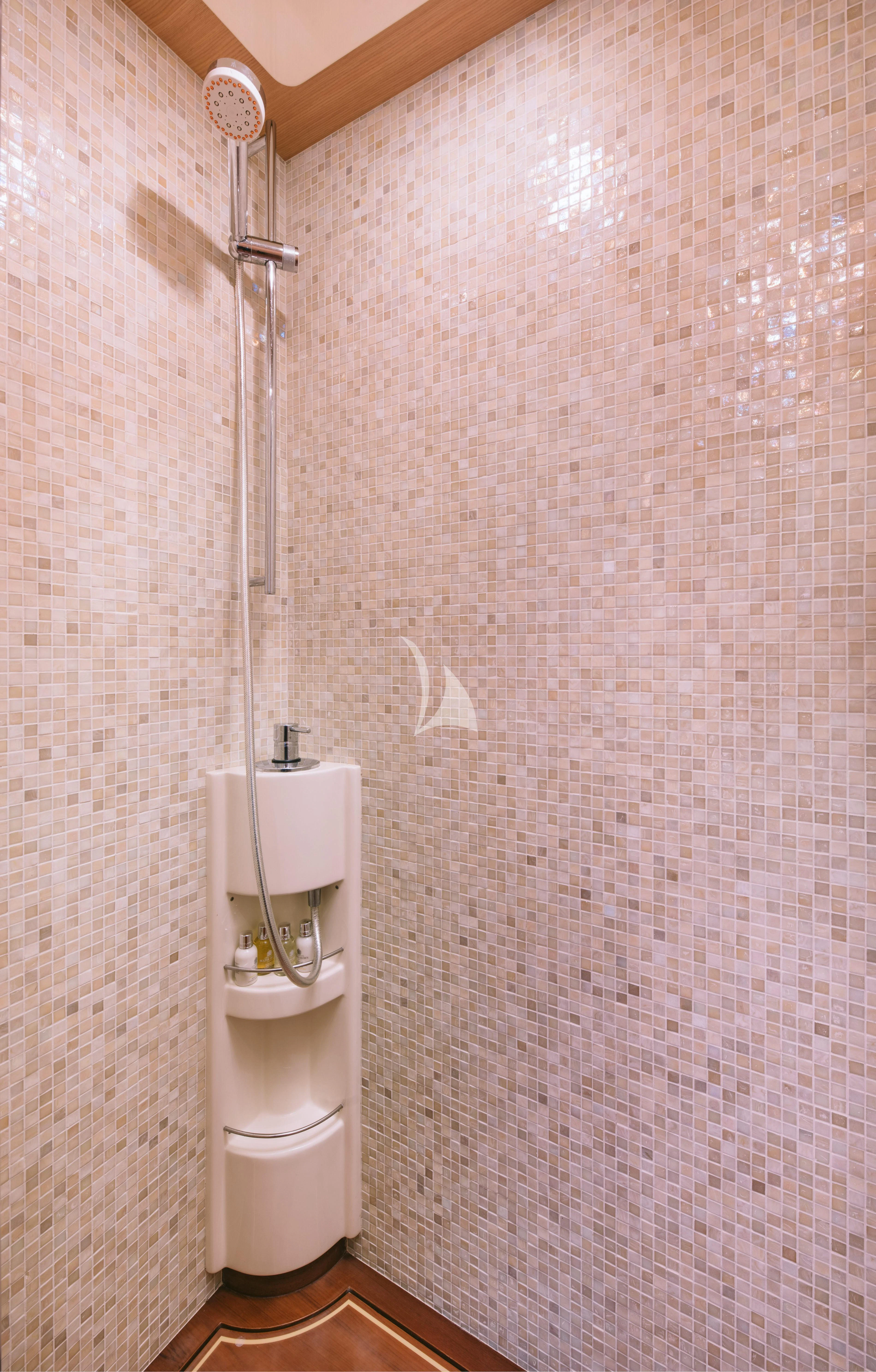 a urinal in a bathroom aboard MAYBE NOT Yacht for Sale