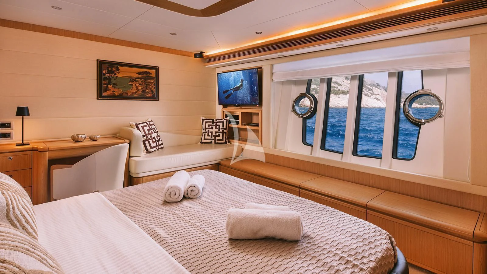 a room with a bed and a window aboard MAYBE NOT Yacht for Sale