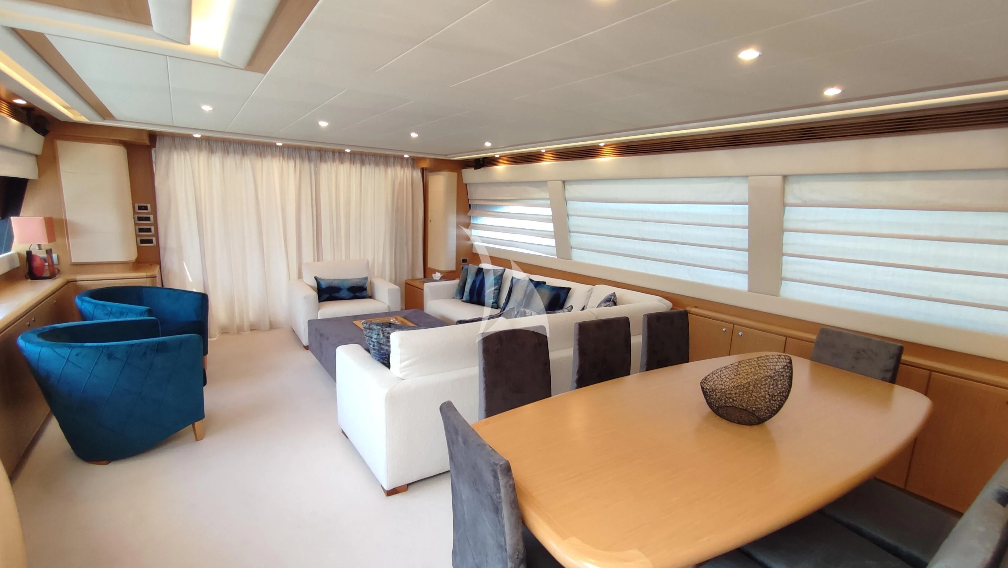 a room with a couch and a table aboard MAYBE NOT Yacht for Sale