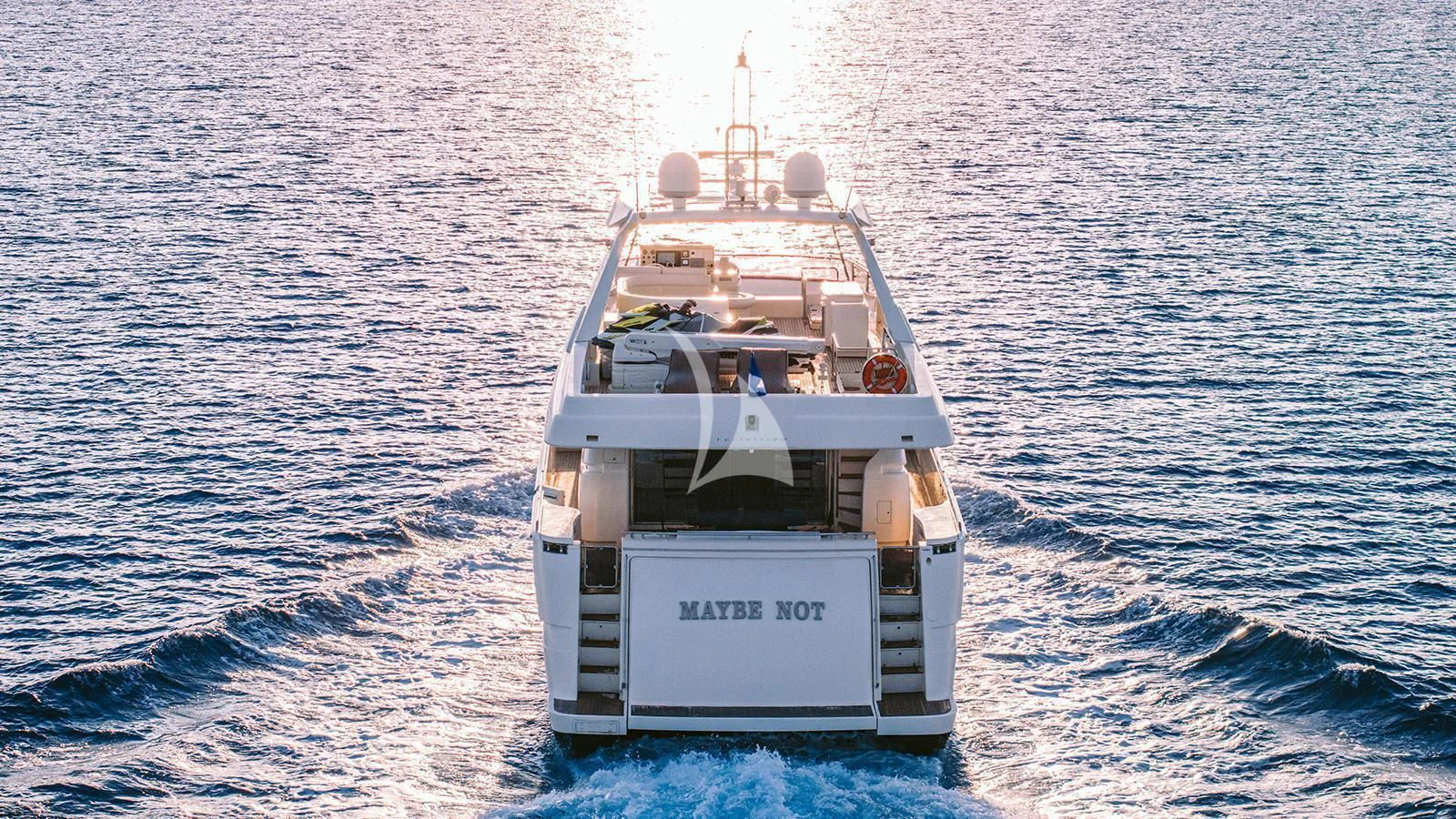 a boat in the water aboard MAYBE NOT Yacht for Sale