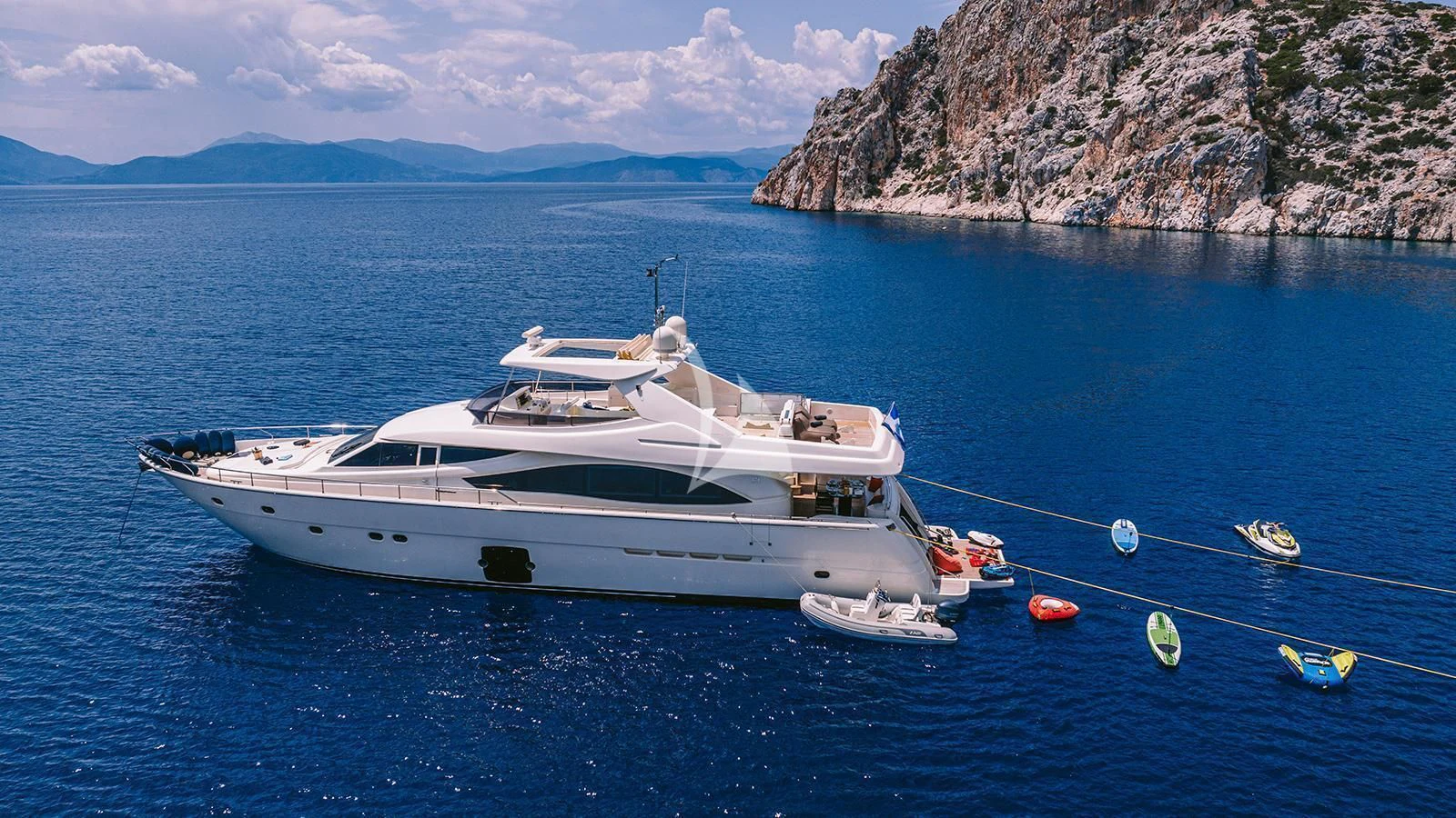 a boat on the water aboard MAYBE NOT Yacht for Sale
