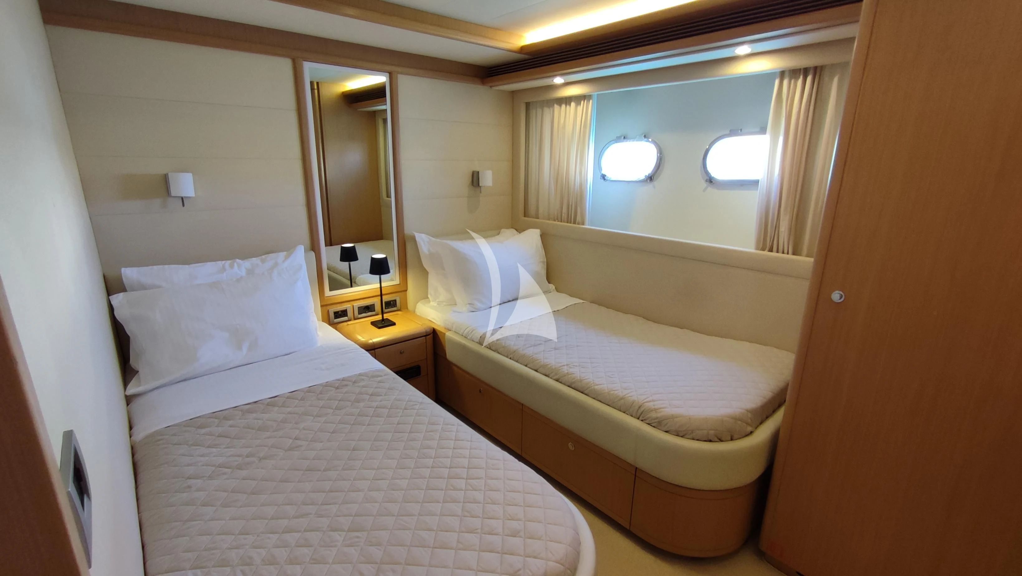 a room with two beds aboard MAYBE NOT Yacht for Sale