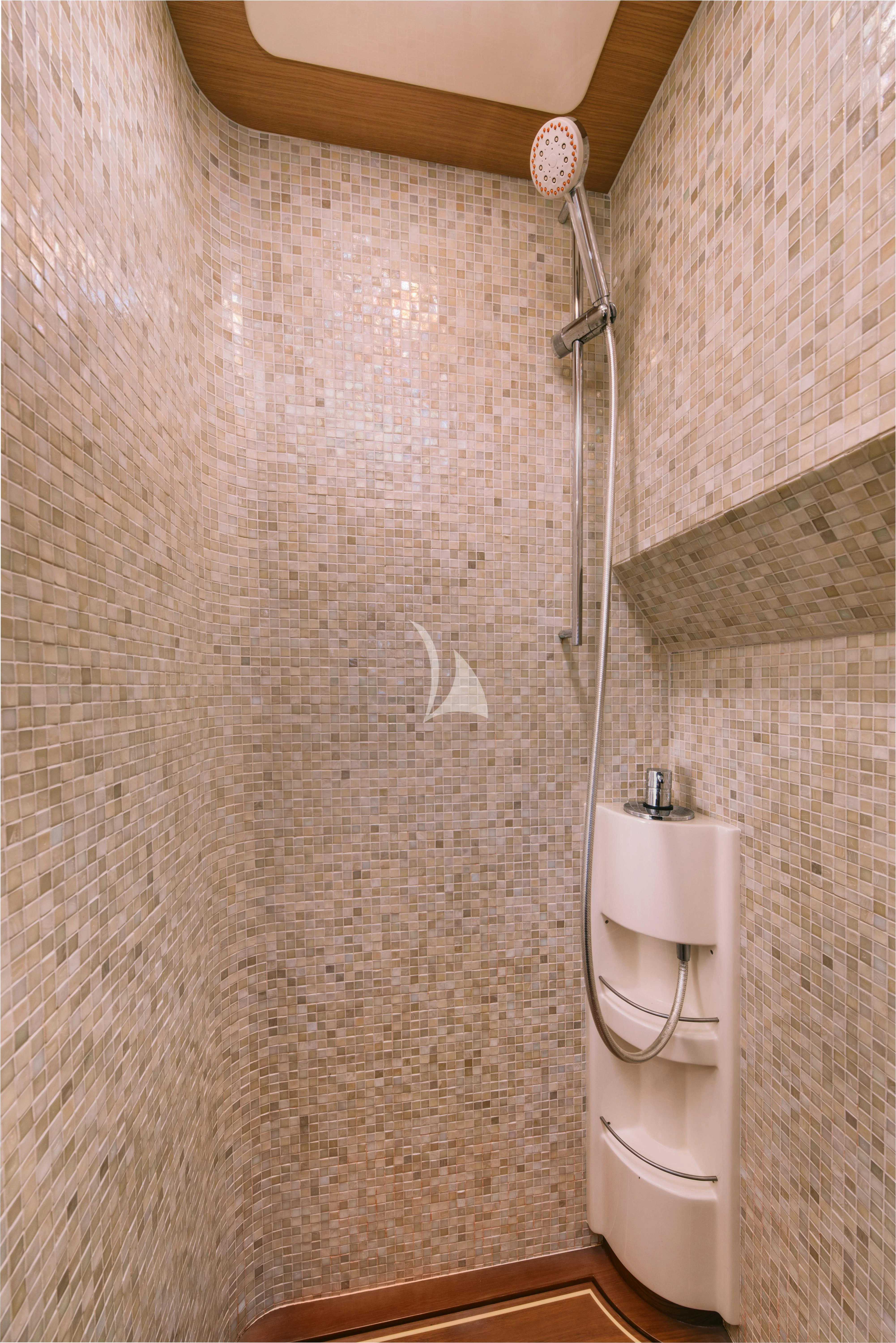 a bathroom with a urinal and a sink aboard MAYBE NOT Yacht for Sale