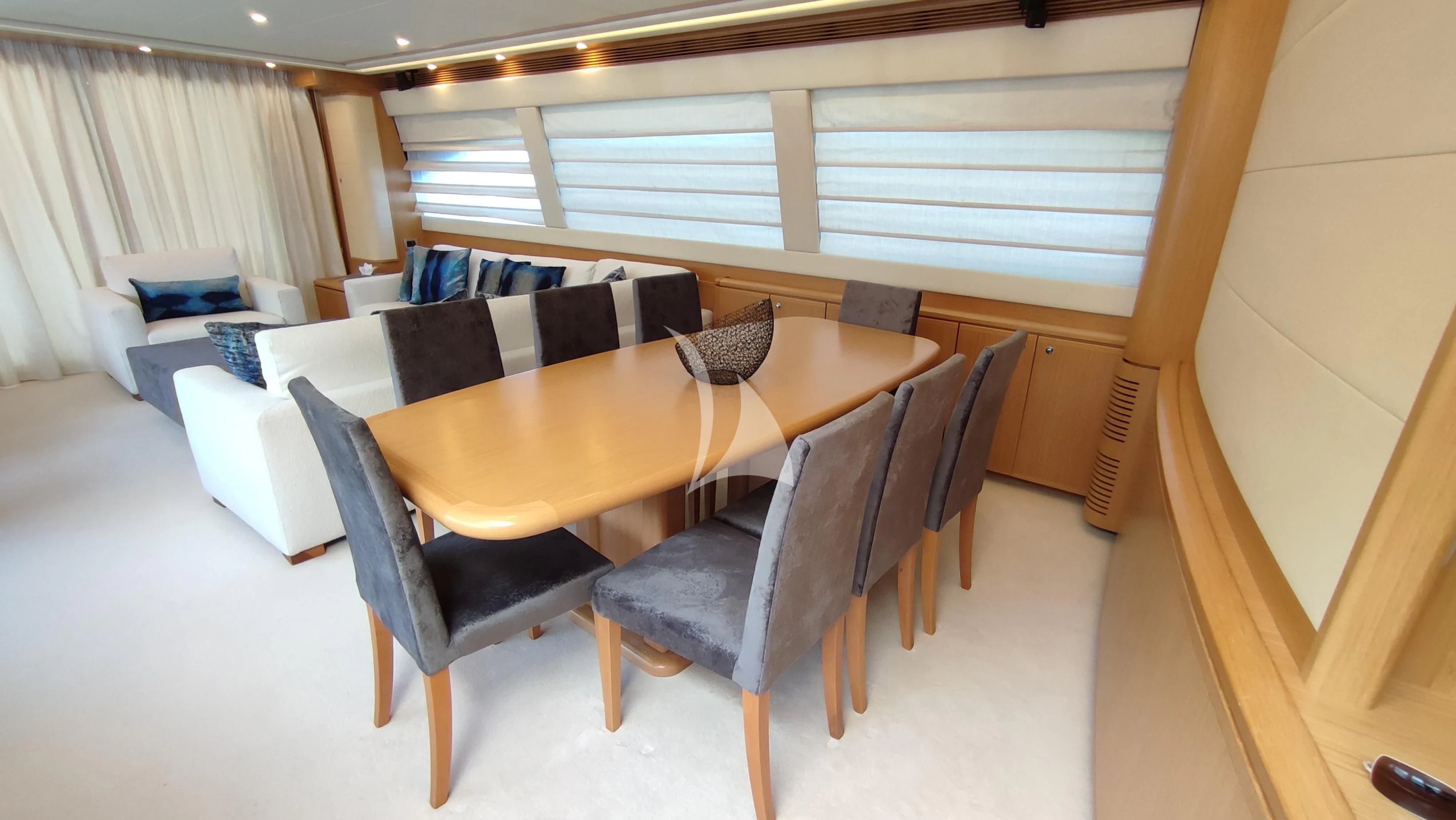 a table and chairs in a room aboard MAYBE NOT Yacht for Sale