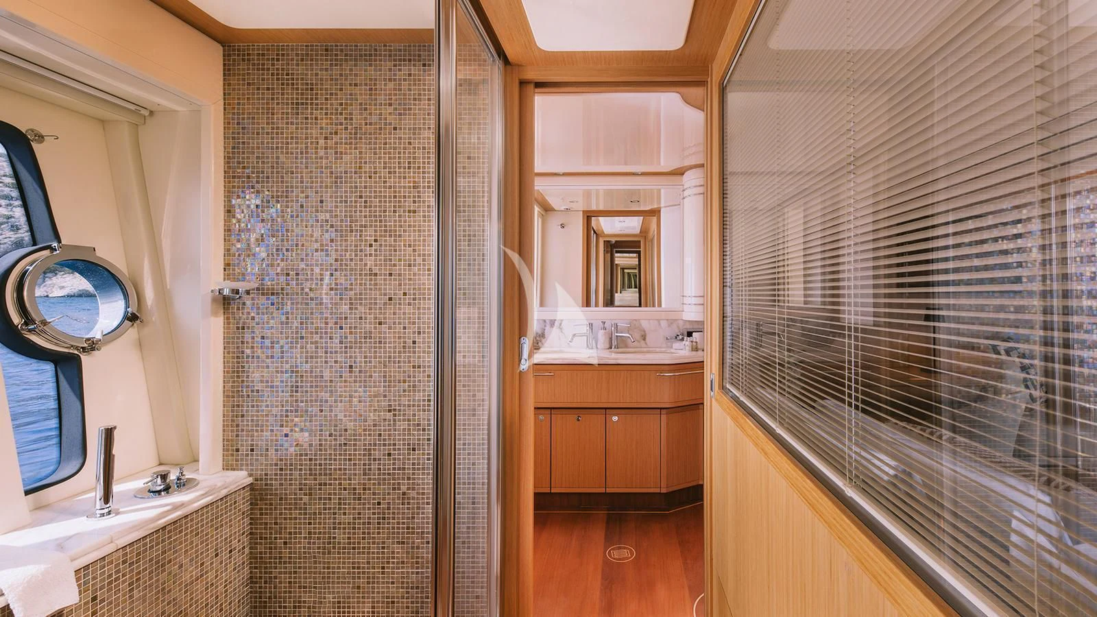 a bathroom with a shower curtain aboard MAYBE NOT Yacht for Sale