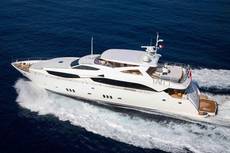 a white yacht on the water aboard FRIVOLOUS Yacht for Sale