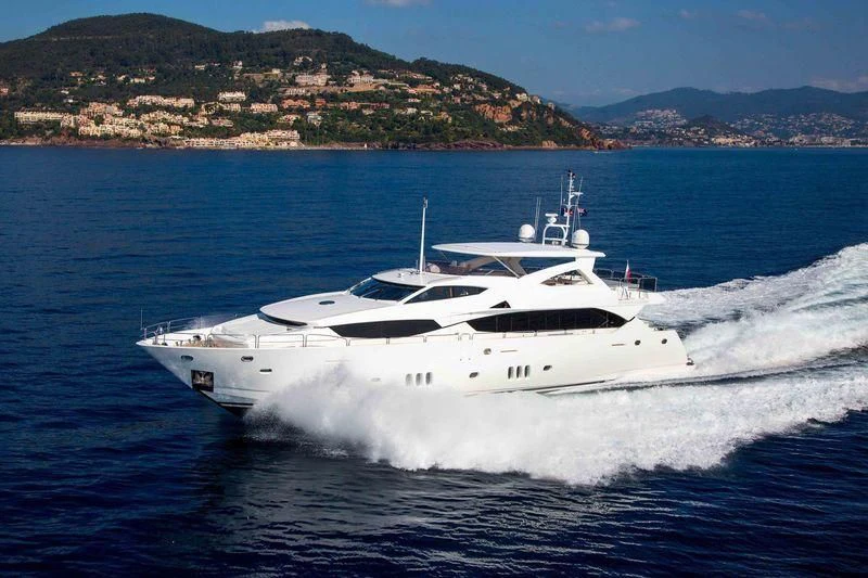 a white yacht on the water aboard FRIVOLOUS Yacht for Sale