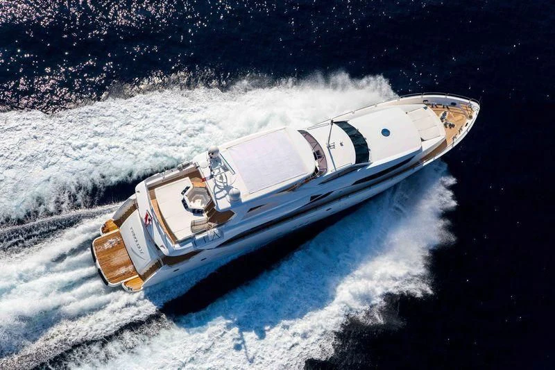 a boat on a body of water aboard FRIVOLOUS Yacht for Sale