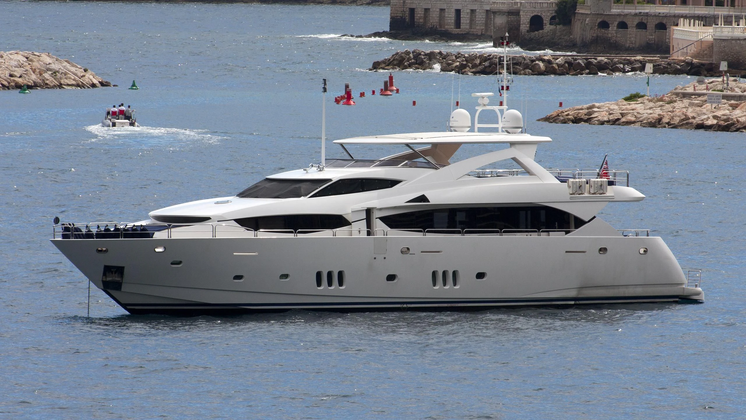 a white yacht in the water aboard FRIVOLOUS Yacht for Sale