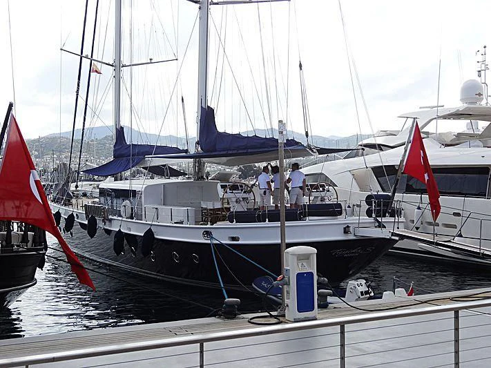 a boat with a red and white sail aboard TUYIKA S Yacht for Sale