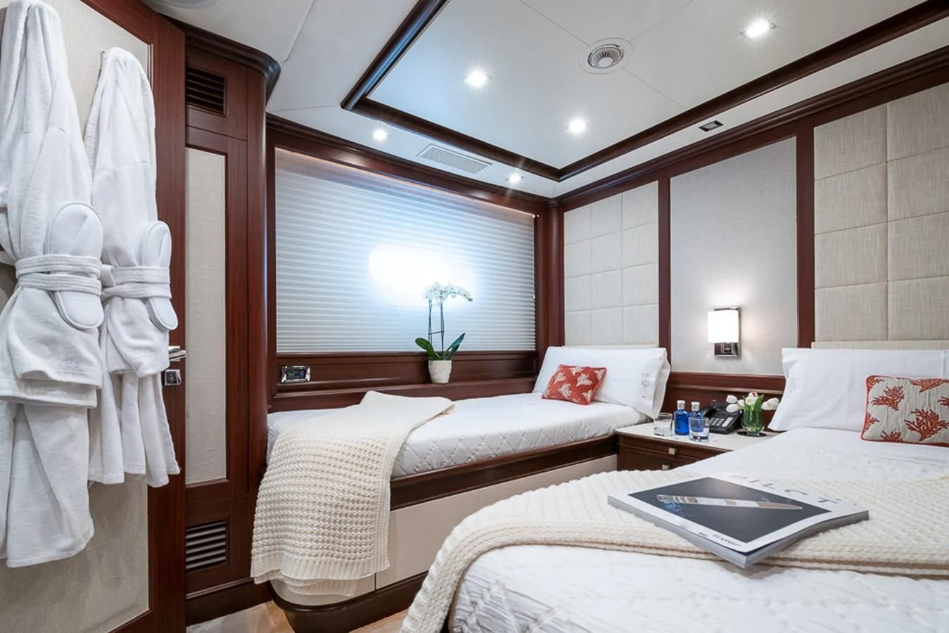 a room with two beds aboard ELENA NUEVE Yacht for Charter