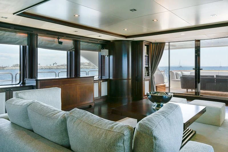 a room with a large window and a view of the ocean aboard ELENA NUEVE Yacht for Charter