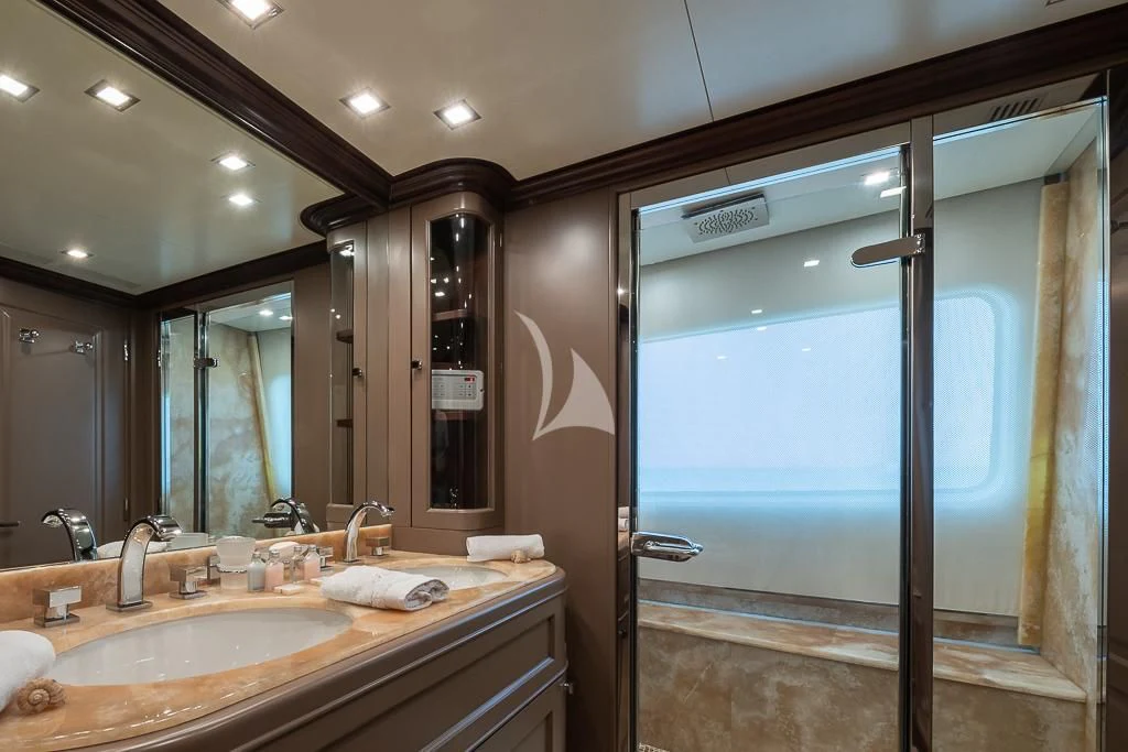 a bathroom with a large glass shower aboard ELENA NUEVE Yacht for Charter