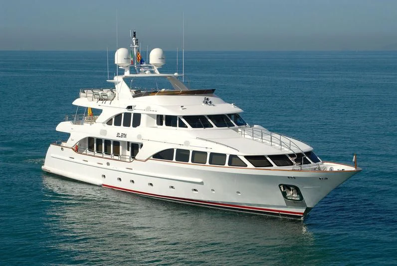a large white boat in the water aboard ELENA NUEVE Yacht for Charter