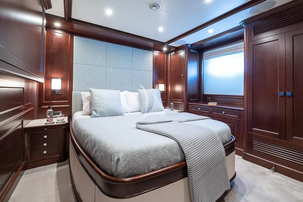 a bed in a room aboard ELENA NUEVE Yacht for Charter