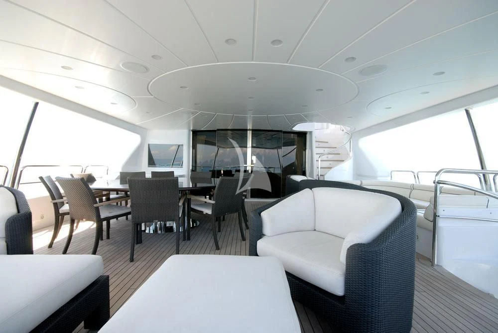 a room with chairs and tables aboard ELENA NUEVE Yacht for Charter