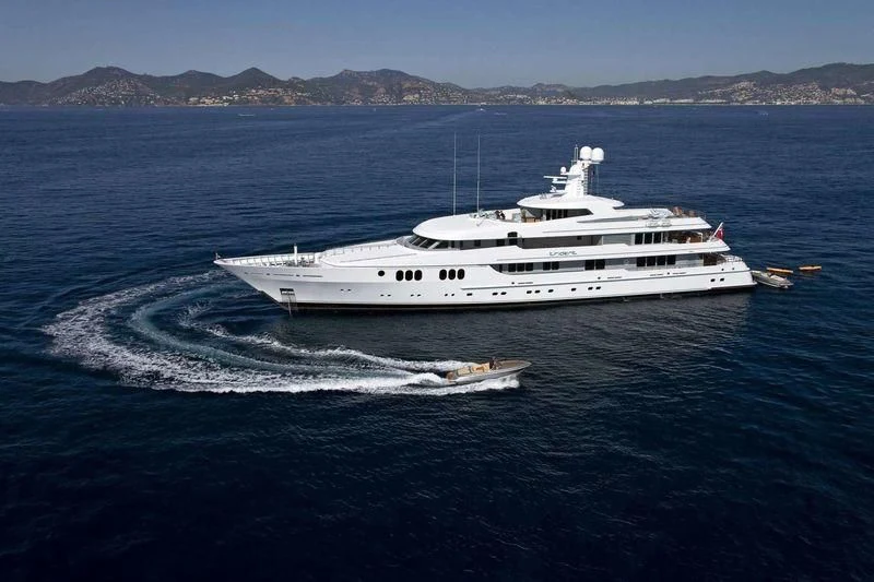 a white boat on the water aboard TRIDENT Yacht for Charter