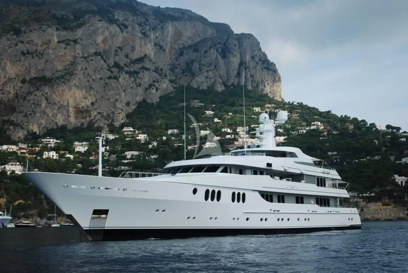 a white boat in the water aboard TRIDENT Yacht for Charter