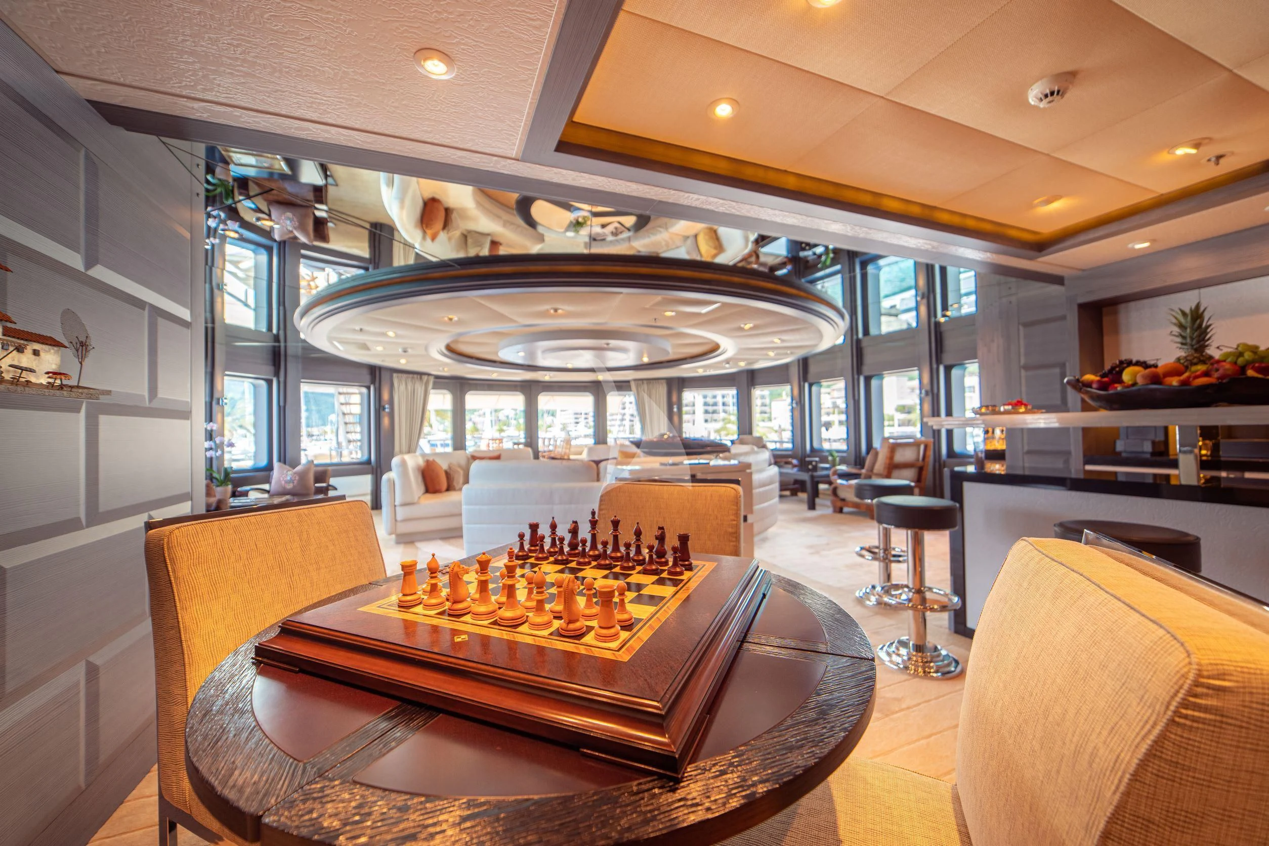 a living room with a large glass ceiling aboard TRIDENT Yacht for Charter