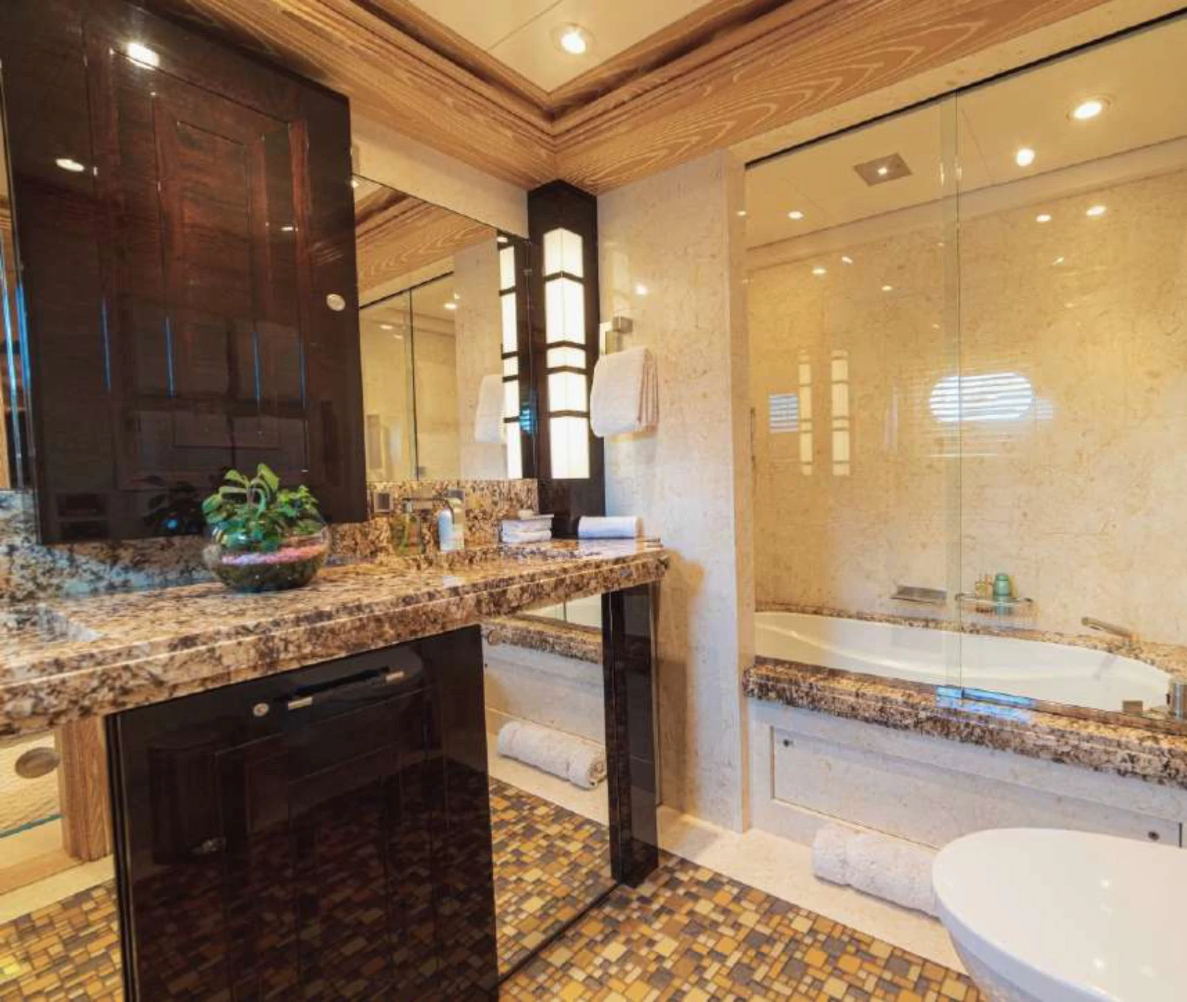 a bathroom with marble counter tops aboard TRIDENT Yacht for Charter