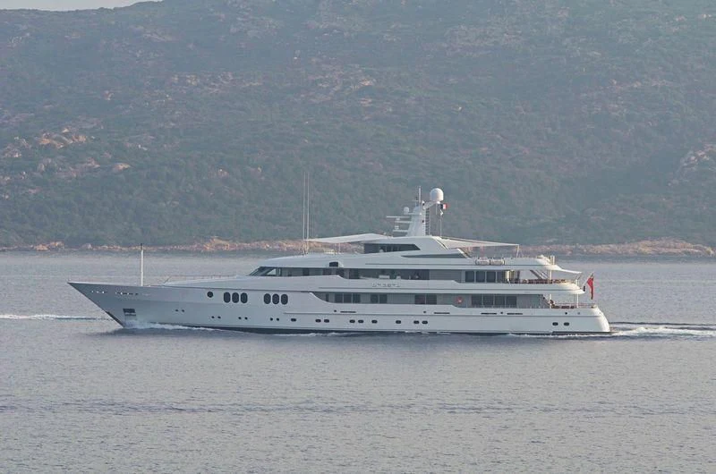 a large white ship in the water aboard TRIDENT Yacht for Charter