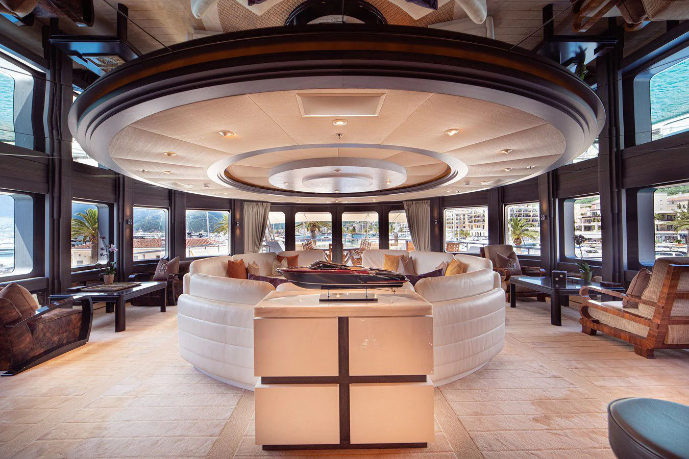 a large room with a large chandelier aboard TRIDENT Yacht for Charter