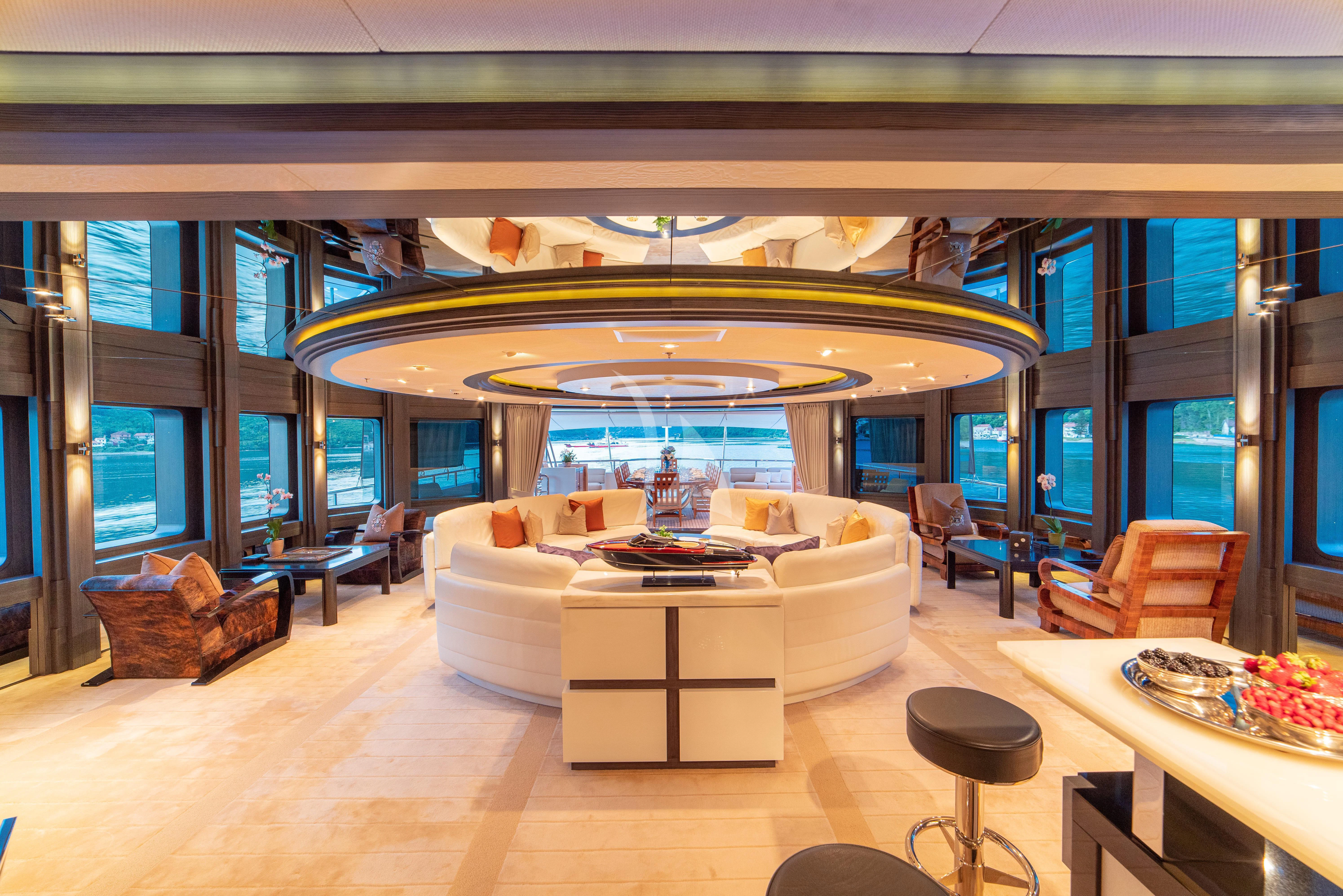 a living room with a large umbrella aboard TRIDENT Yacht for Charter
