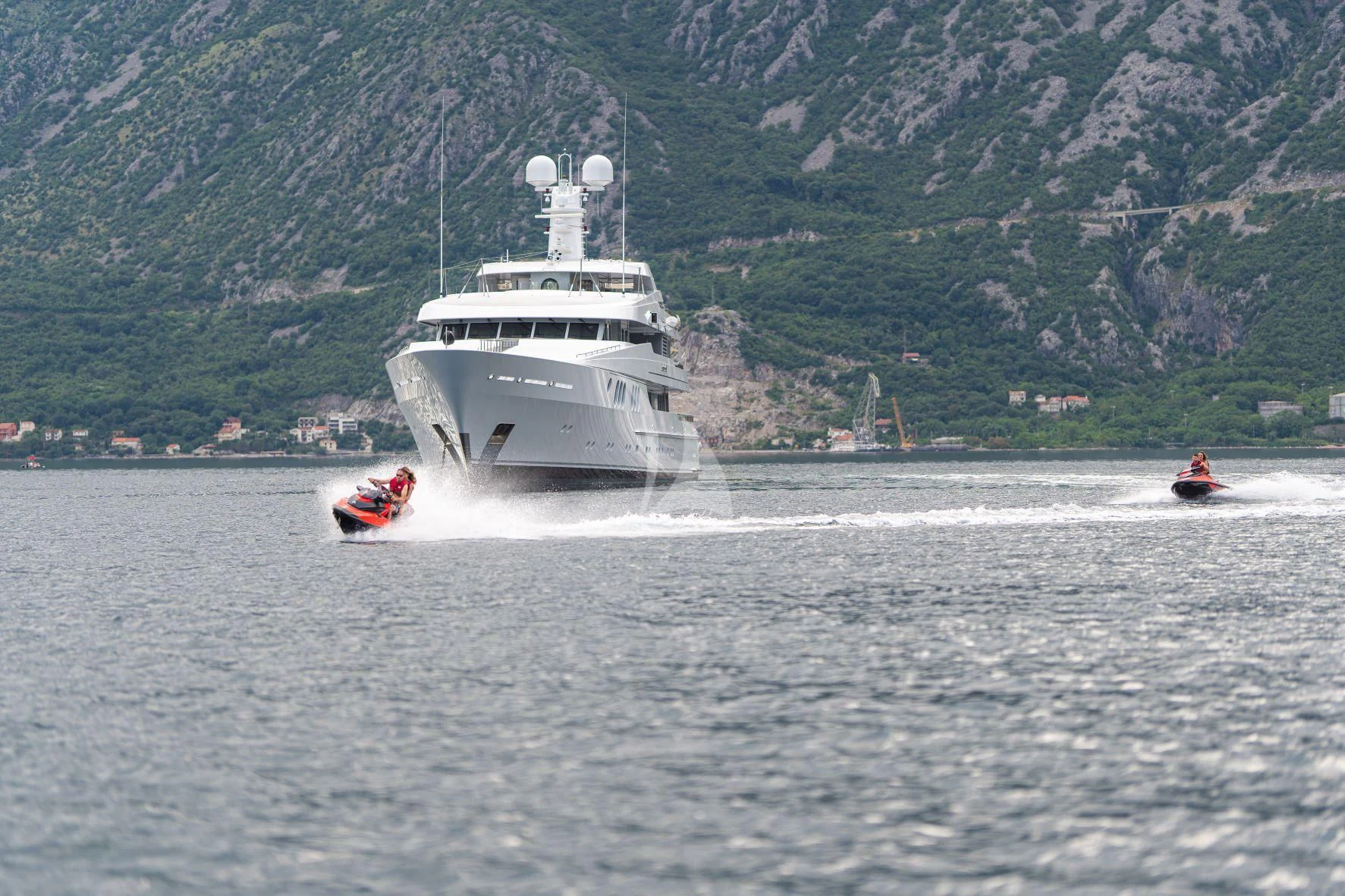 a boat and a person in the water aboard TRIDENT Yacht for Charter