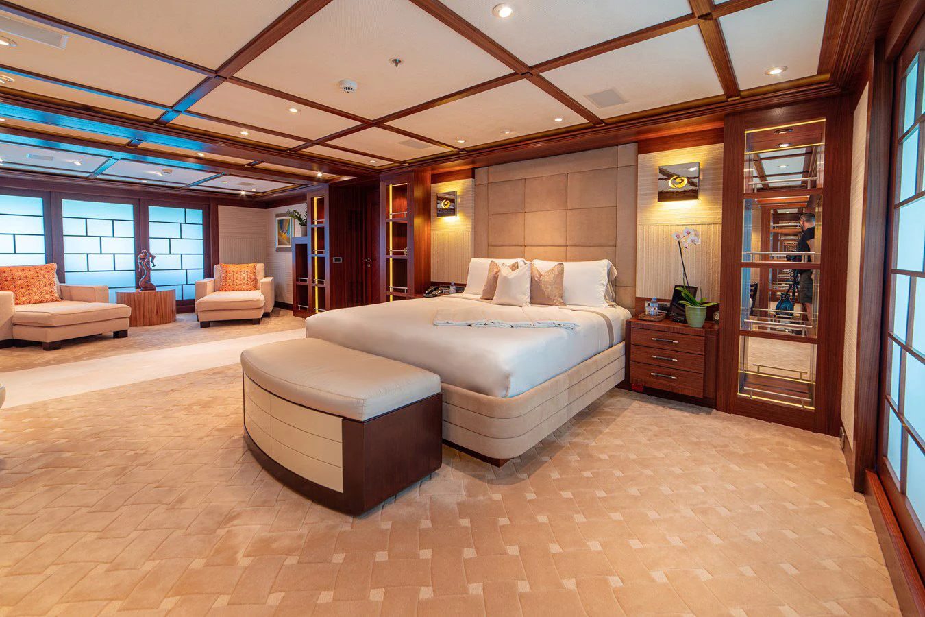 a large bedroom with a large bed aboard TRIDENT Yacht for Charter