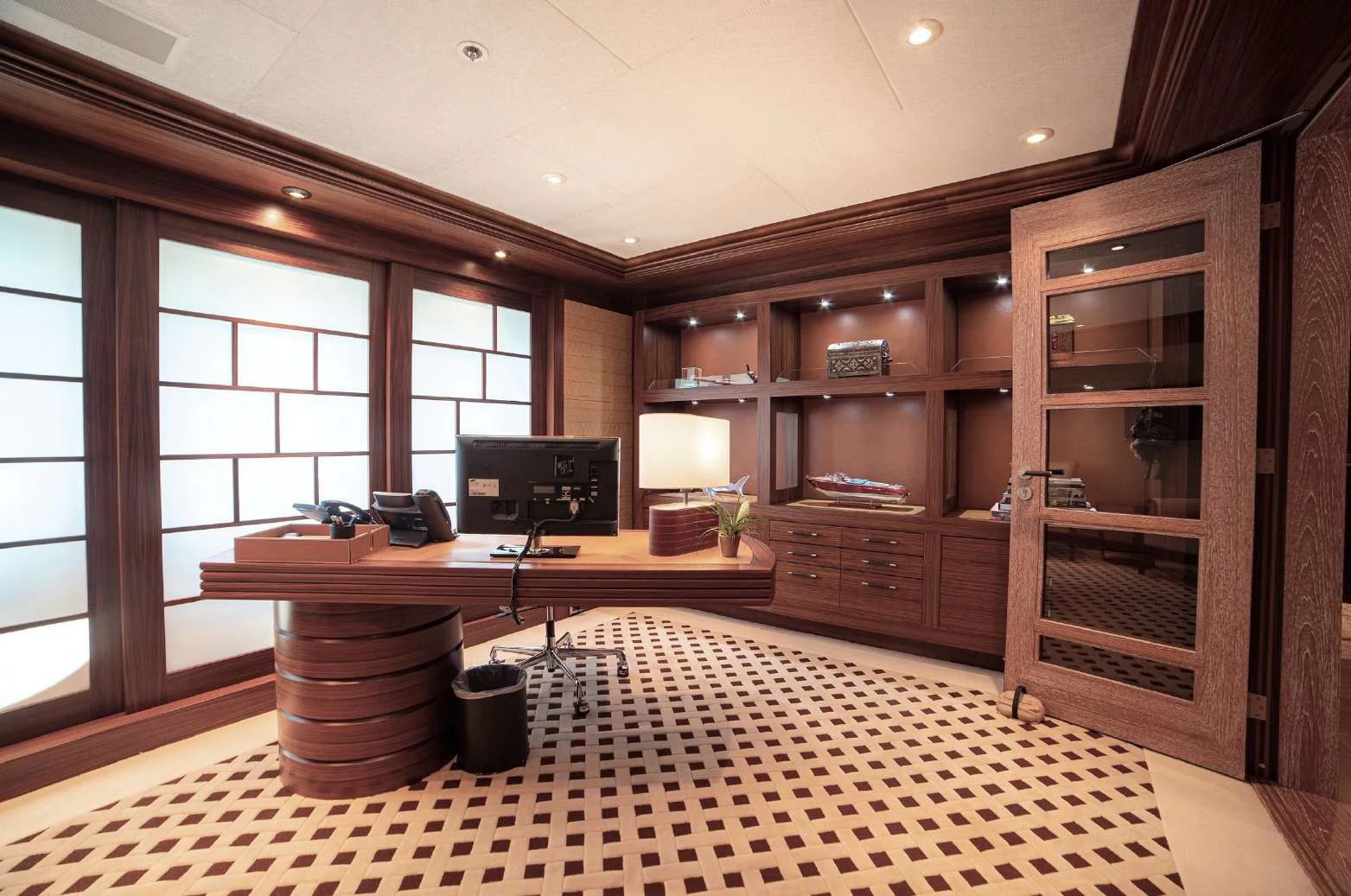 a room with a table and cabinets aboard TRIDENT Yacht for Charter