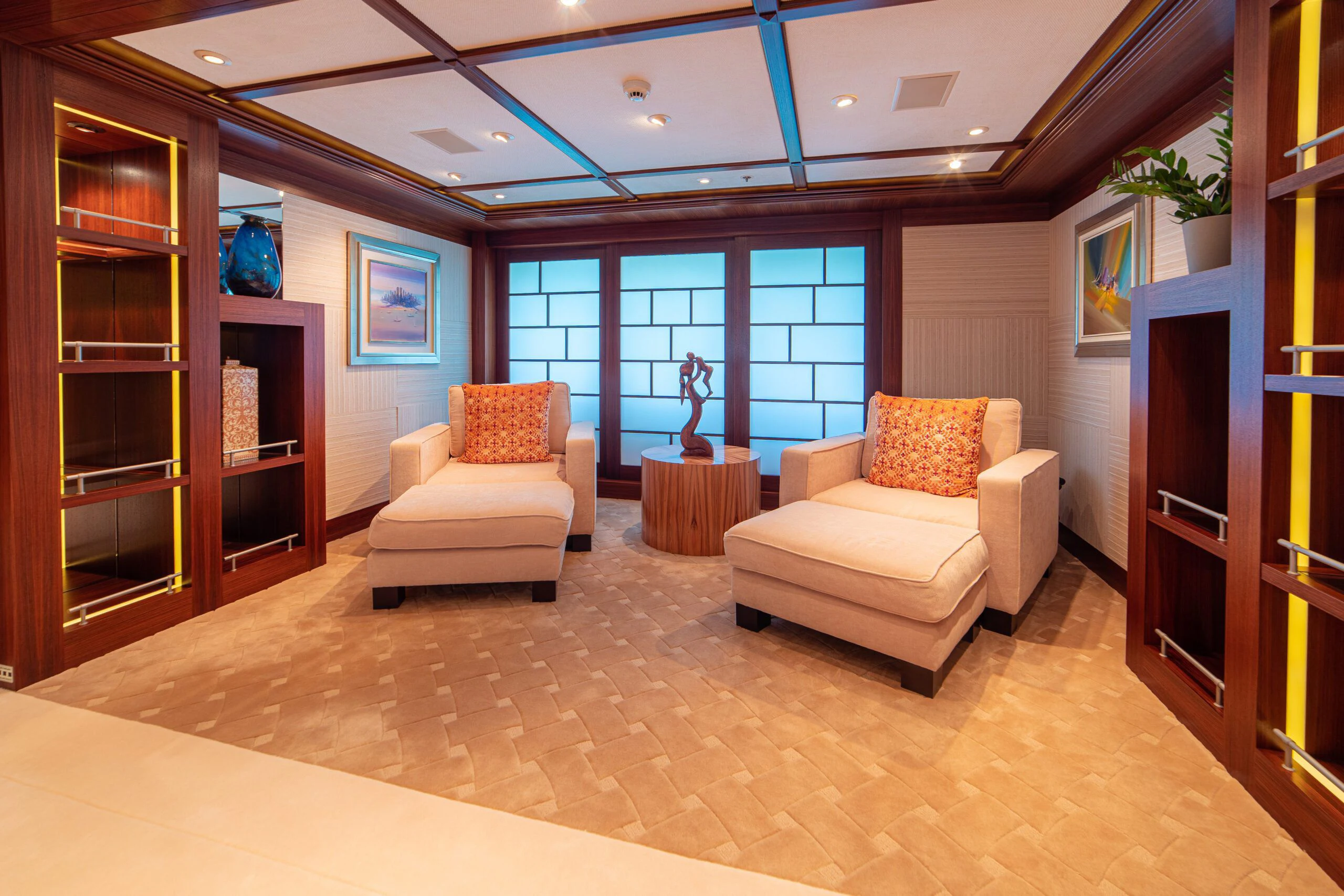 a living room with a large window aboard TRIDENT Yacht for Charter