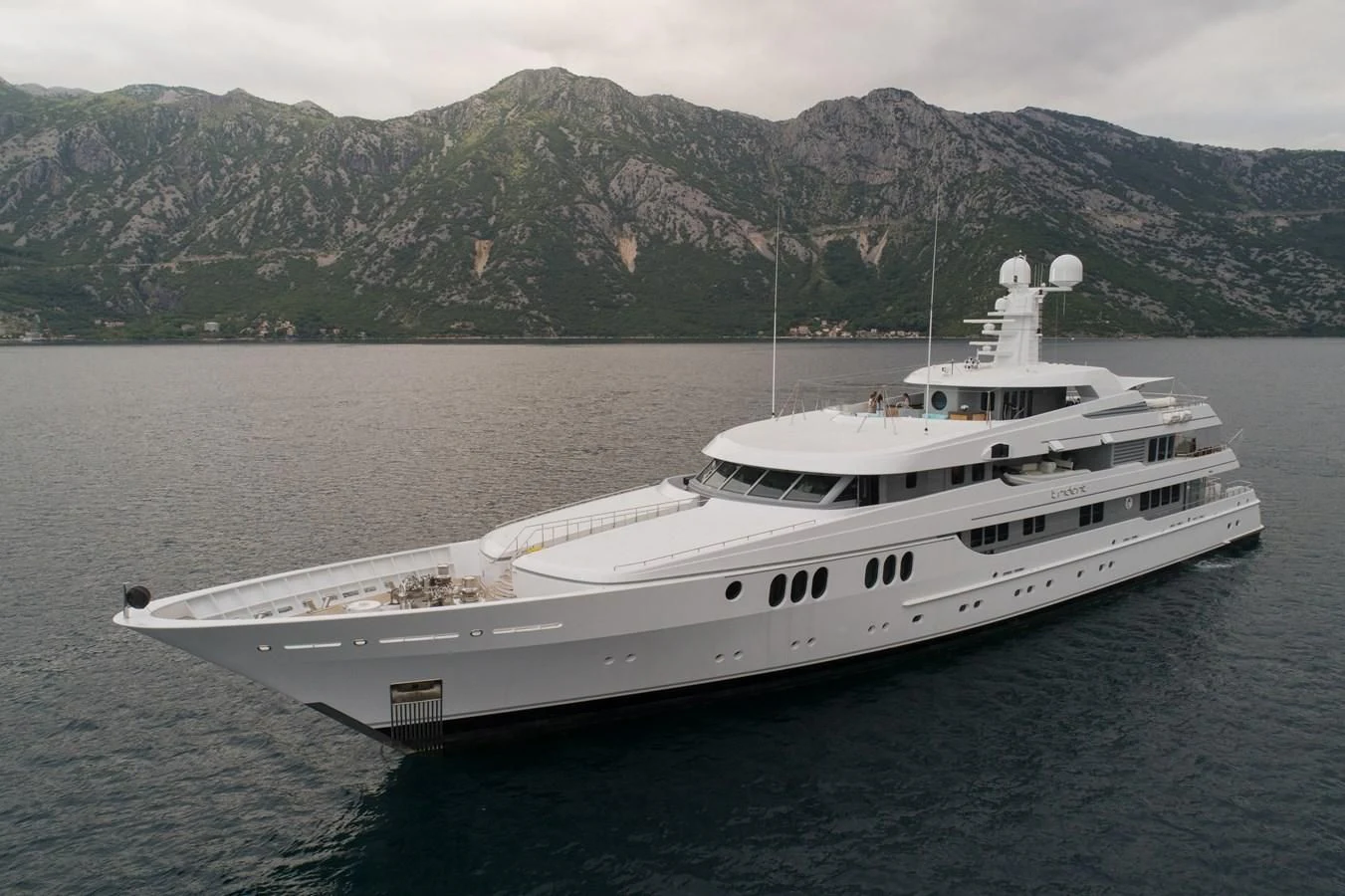 a large ship in the water aboard TRIDENT Yacht for Charter