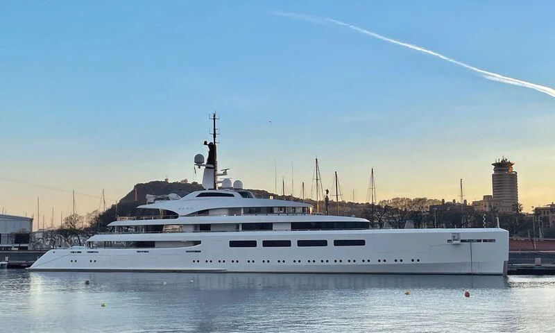 a large white boat on the water aboard VAVA II Yacht for Sale