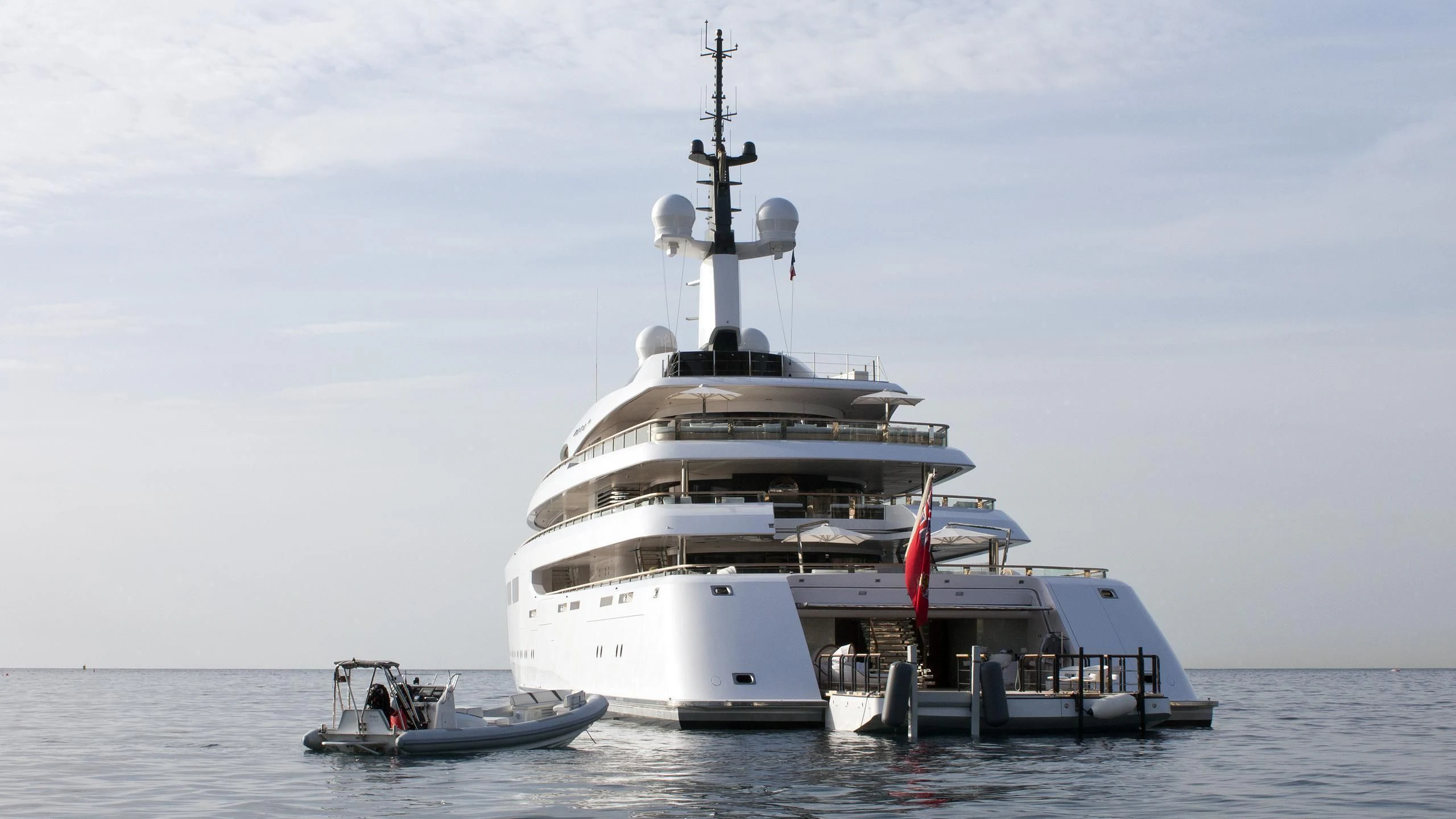 a large white ship in the water aboard VAVA II Yacht for Sale